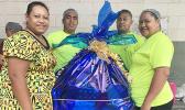 StarKist employees at the canning plant with gifts