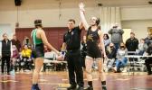 Stephanie Floor (far right) winning one of her wresting tournaments