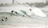 urfers take on large waves generated by Hurricane Douglas at Laie Beach Park, Sunday, July 26, 2020, in Laie, Hawaii. (AP Photo/Eugene Tanner) Surfers in in Laie, Hawaii