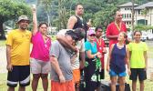 Sandy Scanlan coordinator of the PCSN with some of the athletes with special needs together with their families and friends who received gold medals during the Awards Ceremony of the first adaptive aquatic Swim Meet for special needs athletes in Amerika Samoa last Saturday at Utulei Beach. [Photo: Ese Malala]