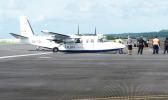 This Jan. 11, 2018 photo, circulated on social media, shows the Talofa Airways plane on its belly on the taxi-way at the main terminal at Pago Pago International Airport.  [Facebook photo]