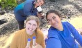 Talofa Fe’a (front right) on a microalgae sampling trip in American Samoa — with Ella Ashford (front left), a 2023 Hollings scholar, and Valentine Vaeoso (back), a staff member at National Park of American Samoa.  Ms Fe’a is a 2024 EPP/MSI summer intern with the National Marine Sanctuary of American Samoa and University of Hawai'i Sea Grant. She studied the risk of ciguatera poisoning in American Samoa. Image credit: Talofa Fe’a]
