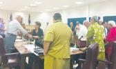 Territorial Administration on Aging Director Evelyn Lili’o Satele and her subordinates appeared to testify on issues raised by the lawmakers. Territorial Administration on Aging Director Evelyn Lili’o Satele shaking hands with lawmakers