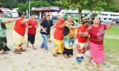 Senior citizens participating in a line dance at Su’igaula
