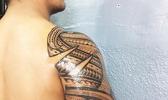 One of the 20 people, so far, who has agreed to get inked and take part in an ongoing study that could possibly prove a link between tattoos and a robust immune system. Pictured is an arm sleeve by Off Da Rock owner Joseph Ioane. See story for full details.  [photo: courtesy]