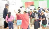 Ms. Faaletaua Saili and Lupelele Elementary students