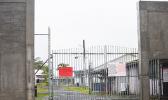 Escape from the TCF by its inmates is a common occurrence despite a high cement wall encasing the prison, with several community residents pointing to the ‘low’ back wall as the problem. TCF