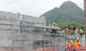 Nana's Construction crew building block wall at TCF