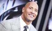 Dwayne Johnson arrived at the May 2015 premiere of “San Andreas” at the TCL Chinese Theatre in Los Angeles. Johnson told GQ for a story published today that he is seriously considering a run for president. [AP file photo]