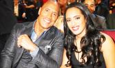 Dwayne "The Rock" Johnson with his daughter in a Samoa News file photo. Dwayne "The Rock" Johnson with his daughter