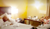 Federal prosecutors in a sentencing statement embedded in court documents contained this photo, extracted from one of the codefendant’s phones, showing the defendant Jonathan Ward (left) and defendant Talalima Toilolo (right) in a hotel room, and a point-of-sale (POS) terminal and wires on the night stand beside them. The photo was created on Dec. 16, 2018, says US Justice Department (USDOJ). [photo: USDOJ Jonathan Ward (left) and defendant Talalima Toilolo (right)