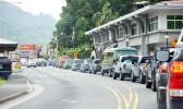 Anytime there is an accident on the road, there is a long line of traffic waiting to move. “Too many cars on the road for a small island,” is the common comment oft received by Samoa News. TRAFFIC BACK UP IN FROM OF POST OFFICE BUILDING