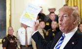 President Donald Trump responds to a reporters question during an event with sheriffs in the East Room of the White House in Washington, Wednesday, Sept. 5, 2018. (AP Photo/Susan Walsh) Donald Trump responds to a reporters