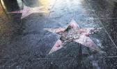 This Wednesday, July 25, 2018 file photo shows Donald Trump’s vandalized star on the Hollywood Walk of Fame in Los Angeles. On Friday, Aug. 3, 2018, The Associated Press has found that stories circulating on the internet that the man arrested for destroying the star will lose his right to vote for the rest of his life, are untrue. (AP Photo/Reed Saxon) Donald Trump’s vandalized star on the Hollywood Walk of Fame in Los Angeles
