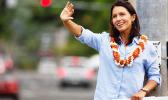  Gabbard sign-waving during a Congressional campaign event in Hawaii.
