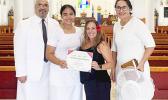 PV2 Morgan Ulu with her parents, Rev. Iasepi and Leone Ripley-Ulu, and SFC Sheri Hoddle