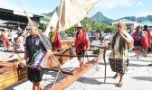 Vaka being carried down to the sea