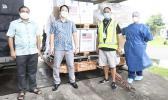 Sanoa govt officials accepting the U.S. vaccine donation