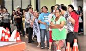 Line of people waiting for vaccinations at the EOB in American Samoa.