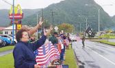 Amata and Veterans wave the U.S. Flag on Veterans Day 2020