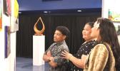 viewing the art at annual Moso'oi Gala