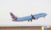  A Virgin Australia Boeing 737 takes off at Auckland Airport. [Photo / Grant Bradley via NZ Herald] 