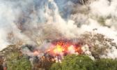 This Wednesday, May 16, 2018, image provided by the U.S. Geological Survey shows lava spattering from an area between active Fissures 16 and 20 photographed at 8:20 a.m. HST, on the lower east rift of the Kilauea volcano, near Pahoa, Hawaii. Plumes range from 1 to 2 kilometers (3,000 to 6,000 feet) above the ground. Officials say some vents formed by Kilauea volcano are releasing such high levels of sulfur dioxide that the gas poses an immediate danger to anyone nearby. (U.S. Geological Survey via AP) 