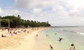 Waikiki Beach with sun bathers and swimmers