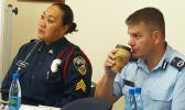 DPS Detective Vaivasa Wells (left), pictured with Matthew Varley