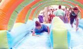 The water slide bounce was a big hit on Saturday during the the 2nd Annual MASI Easter Bash at le Suigaula a le Atuvasa in Utulei. [Photo: EM]
