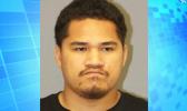 Si Ufaga Moana was charged Wednesday with abuse of a family member in the presence of a child. [photo: HPD]