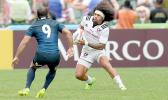 At the HSBC World Rugby Sevens Series XVIII in Hong Kong on April 8, 2017 USA's Folau Niua heads for the try line against Argentina.  USA beat Argentina 33-5 to win Pool D with 9 points.   USA will face England in the Cup quarter finals.  Argentina  will play Australia, winner of Pool A.