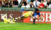 Gordon Langkilde scores in the corner in Hong Kong against Australia.  Australia, the top seed in pool A, narrowly beat Samoa 22-19.  Samoa now faces England and Korea on Saturday in their other two pool play matches at the 2017 Cathay Pacific/HSBC Hong Kong Sevens.  