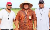 The Head Coach of the Nu’uuli Wildcats Football Program, NVTHS Principal Tupa’i Rod Atafua (center) posing for a coach’s photo with his assistant coaches Bill Ena (right) and Sene Ilileli (left) – not pictured are Christian, Viliamu, Pualau and Robert. [photo: TG]