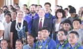 New Zealand foreign affairs minister Winston Peters and the cross party political delegation stand with students from Niue High School. Photo: RNZ Pacific / Caleb Fotheringham Winston Peters and others