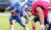 Samoa News Player of the Game, Moe Faleali’i scored three touchdowns in their Varsity battle against the Vikings to lead Samoana to victory, their third win as they closed off their regular season performance on a high note with a 24 - 22 win against the Vike’s. They play Tafuna is playoffs this Saturday. [photo: TG]
