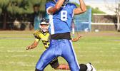 Ralph Taufa’asau with the two-hand grab as he catches this long bomb from his quarterback, for a huge Samoana gain. Taufa’asau scored two touchdowns in their 13 - 6 win against the Wildcats last Friday evening. [photo: TG]
