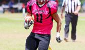 Vito Kitiona at the sidelines storming towards the end zone for a huge Faga’itua gain in the opening quarter of their match against Nu’uuli last Saturday afternoon. Kitiona helped the Vikings in their 14 - 28 comeback victory against the Wildcats.  [photo: TG]