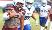Tafuna Warriors ball carrier at the sidelines and