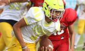 Oakland ‘Oakie’ Salave’a scrambling to take this one for a huge Lions first down during the first quarter of their JV match up against the Vikings. 