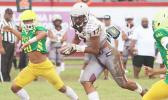 Frank Mulipola weaving his way through midfield 