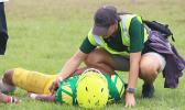 ASHSAA/JPS ATC Florence Wasko tending to an injured Leone Lion